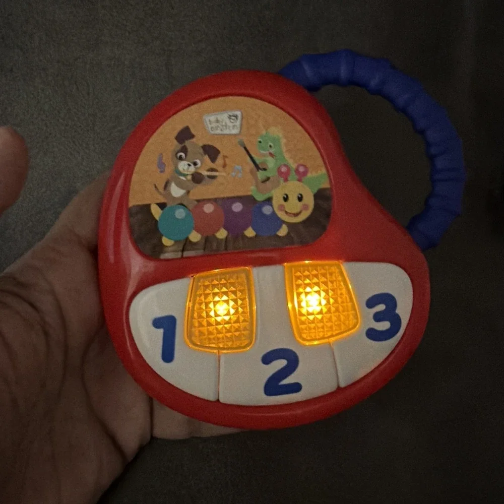 Baby Einstein Keys To Discover Play Mini Handheld Piano